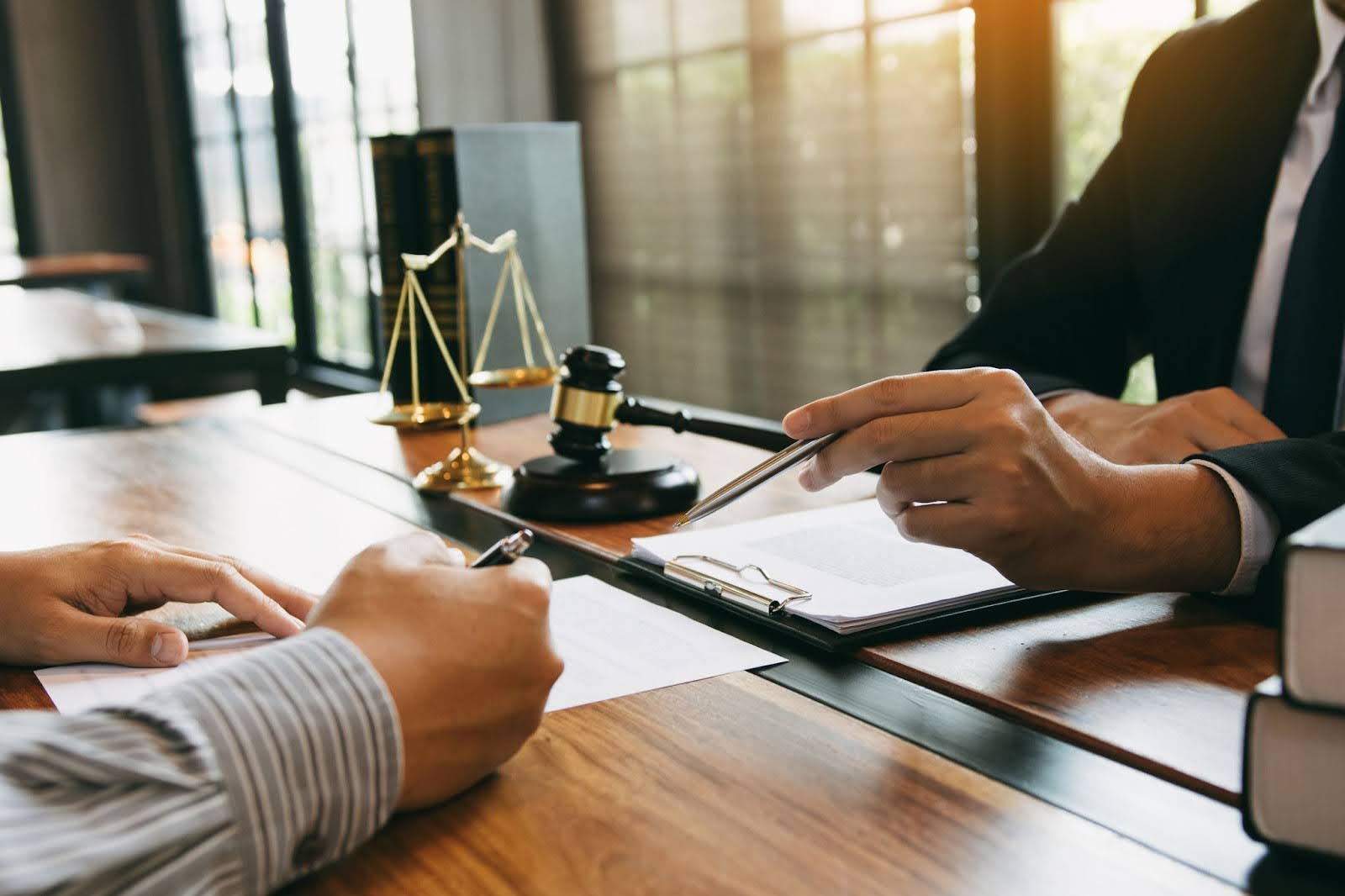 lawyer and client class action lawsuit meeting